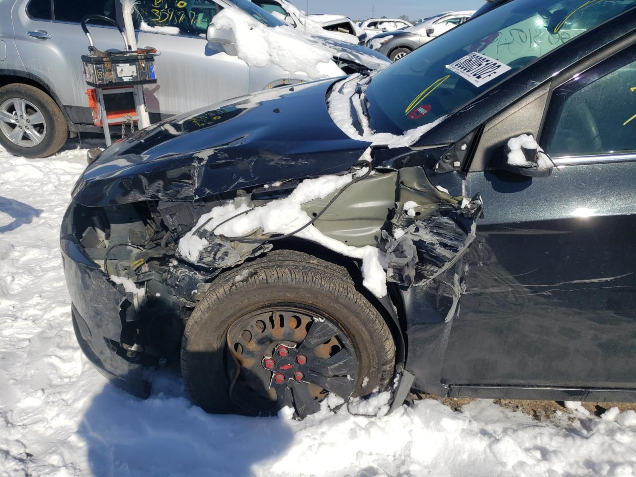 Photo 9 from auction – 2012 CHEVROLET CRUZE LS with VIN 1G1PC5SHXC7384945