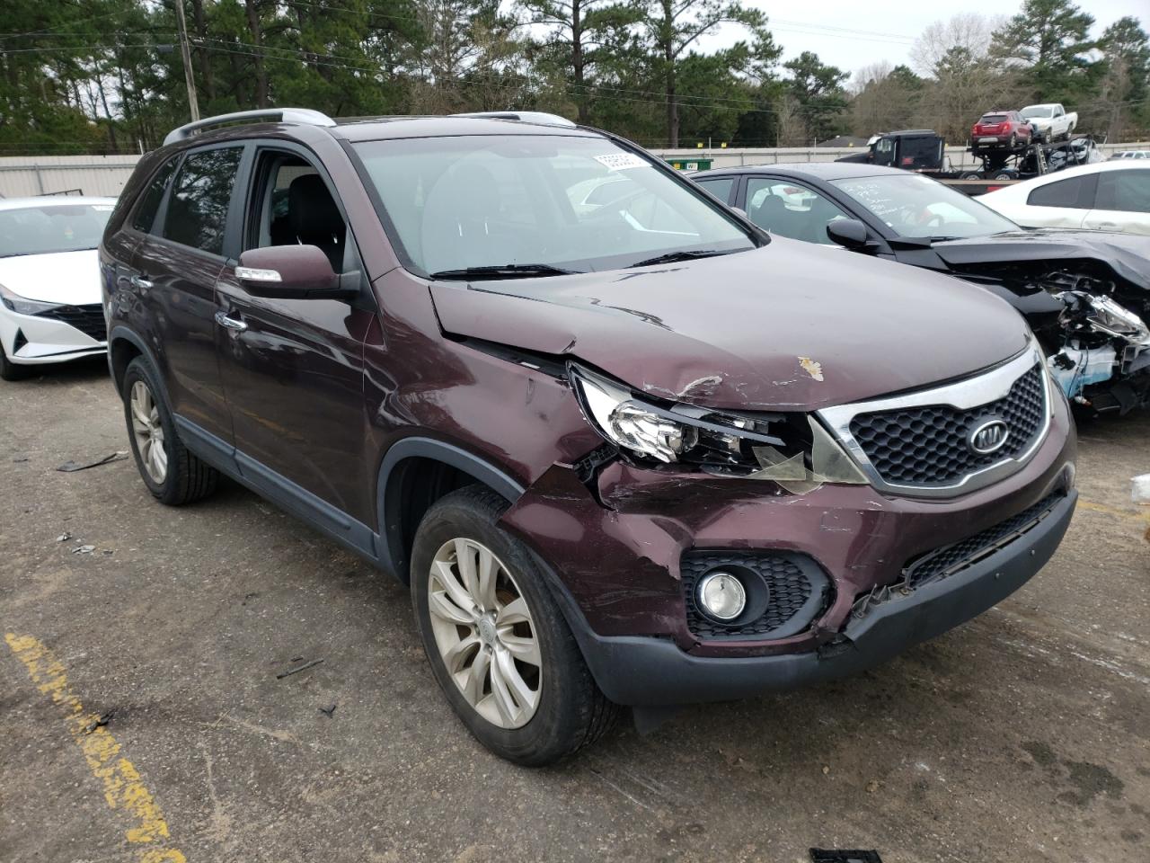 KIA SORENTO EX 2011 with VIN 5XYKU4A14BG023712 - Photo from auction