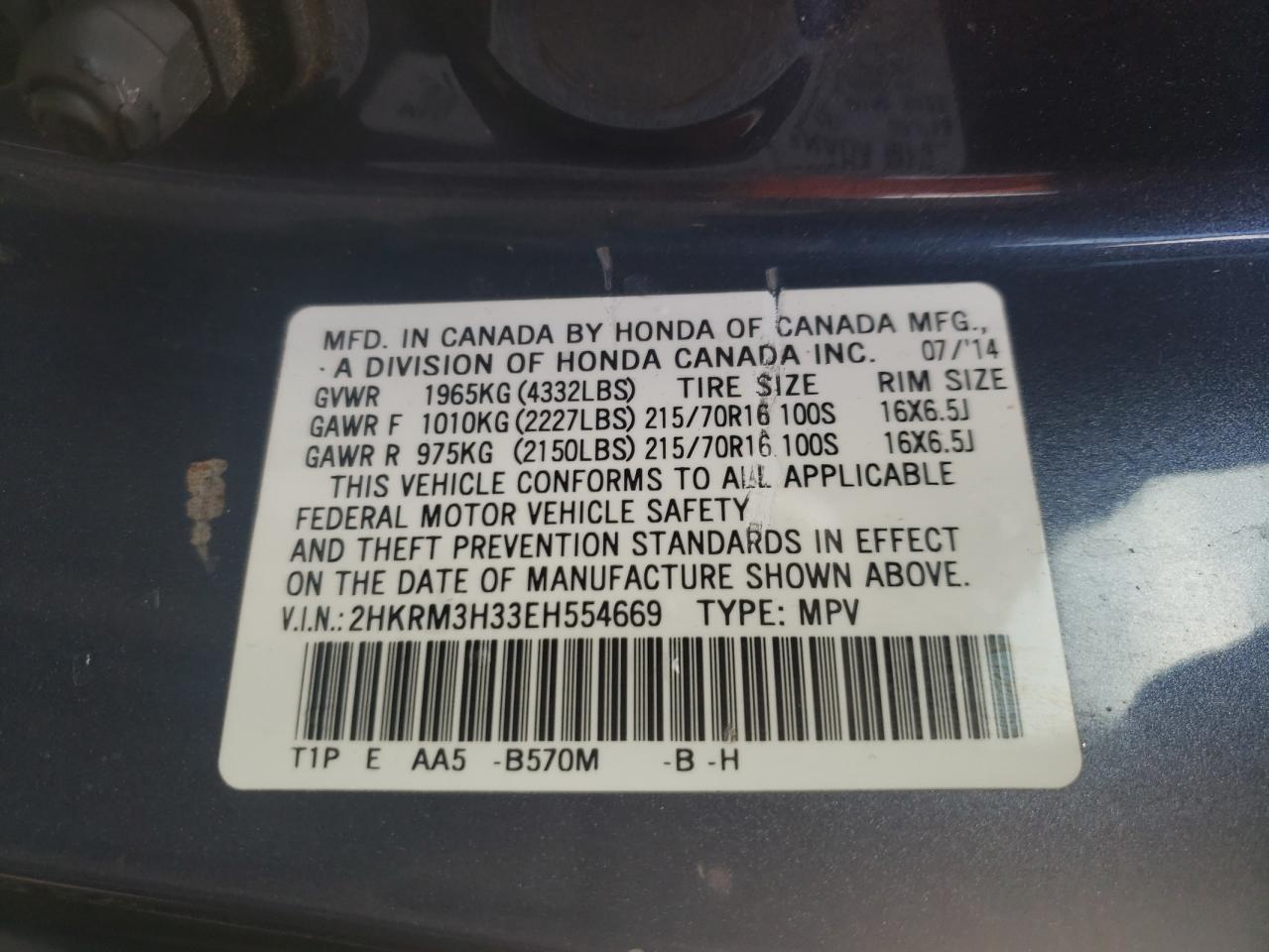 Photo 11 from auction – 2014 HONDA CR-V LX with VIN 2HKRM3H33EH554669