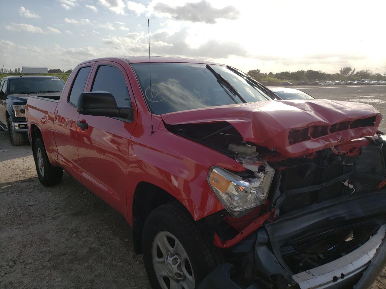 TOYOTA TUNDRA DOU 2014 with VIN 5TFRU5F10EX032969 - Photo from auction