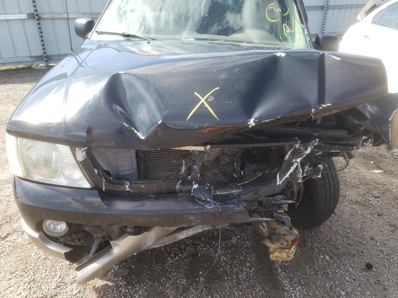 Photo 7 from auction – 2004 FORD EXPLORER E with VIN 1FMDU74W14UB62243