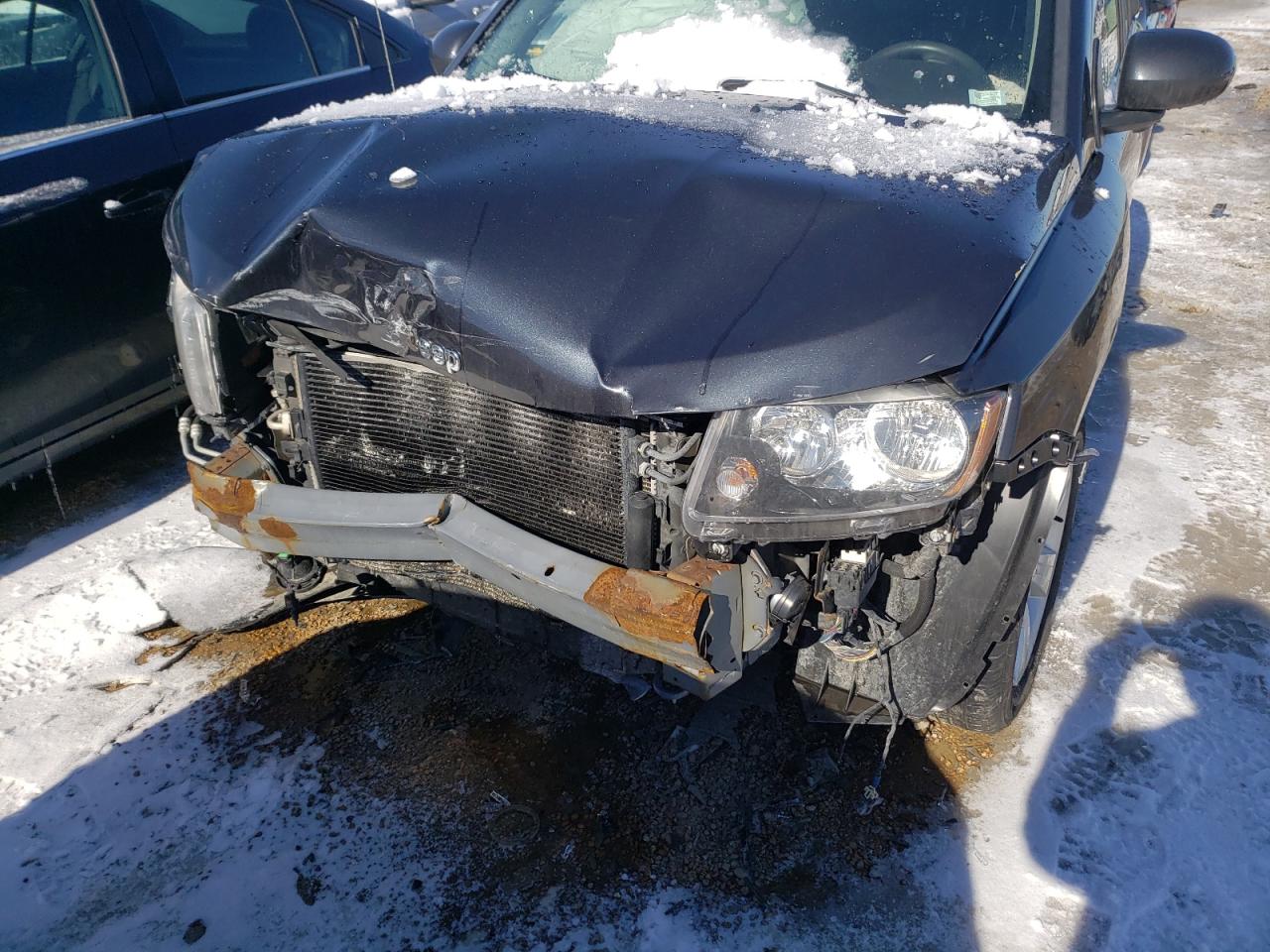 Photo 9 from auction – 2014 JEEP COMPASS with VIN 1C4NJDEB7ED530356
