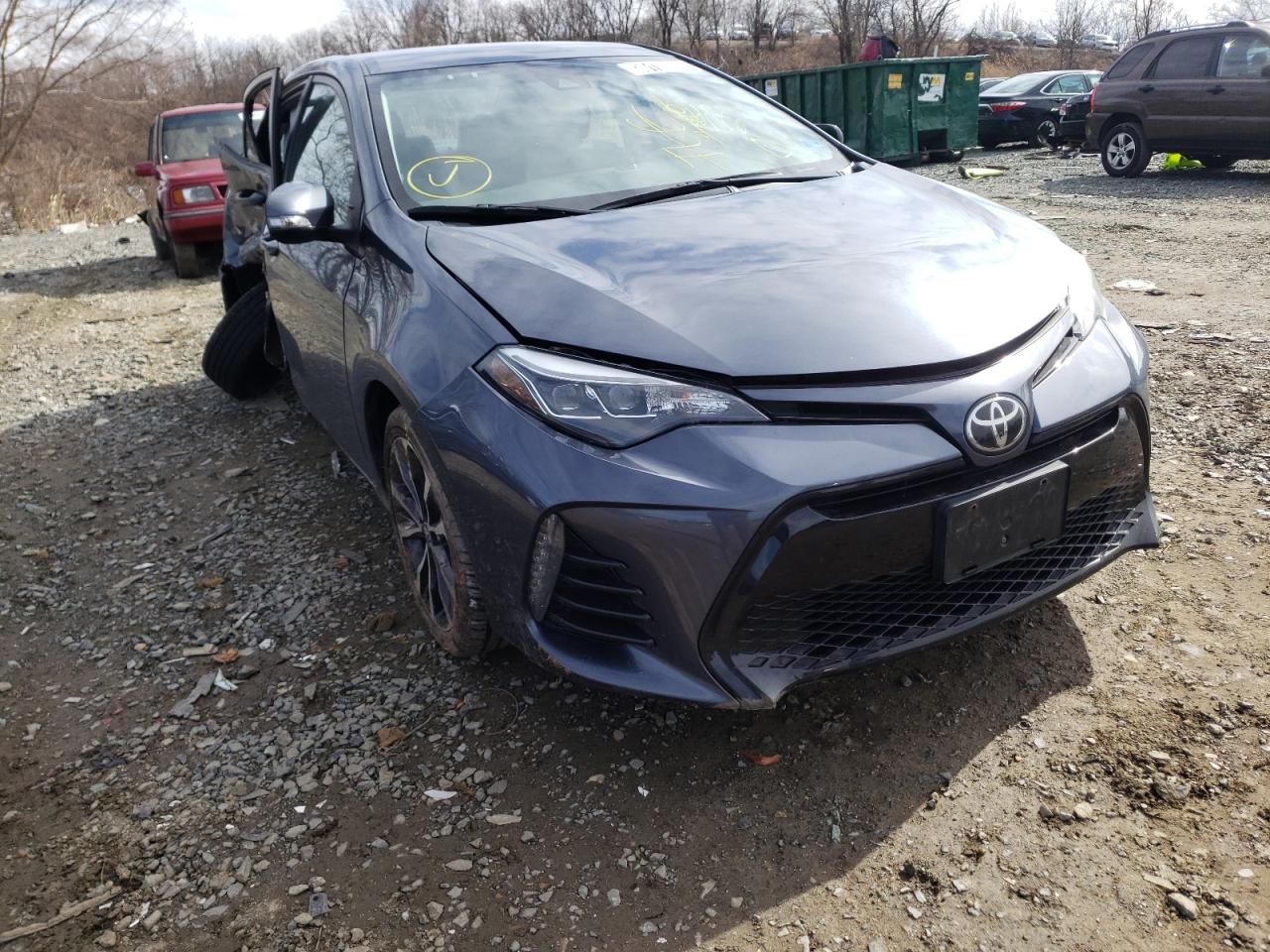 TOYOTA COROLLA L 2017 with VIN 5YFBURHE3HP690586 - Photo from auction