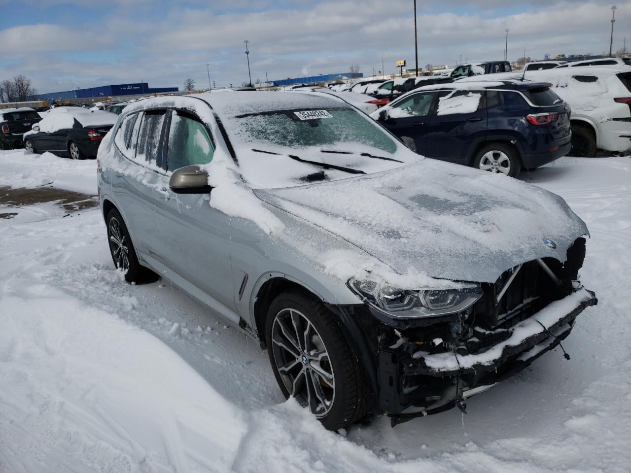 BMW X3 XDRIVEM 2019 with VIN 5UXTS3C56K0Z09698 - Photo from auction