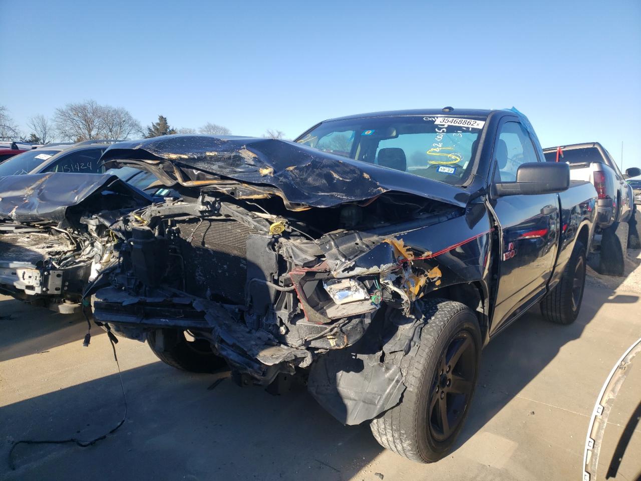 Photo 2 from auction – 2014 RAM 1500 ST with VIN 3C6JR6ATXEG101174