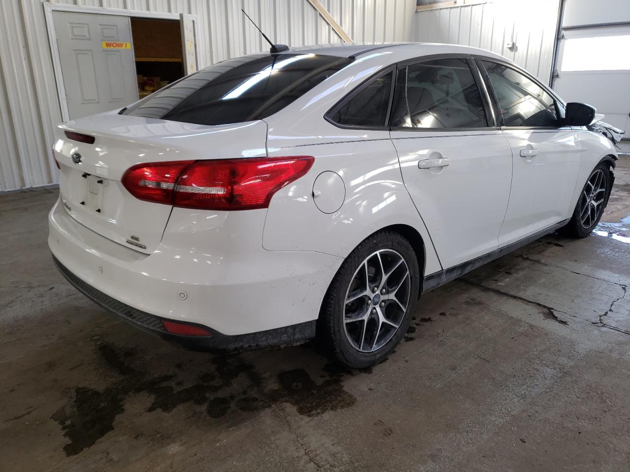 Photo 4 from auction – 2016 FORD FOCUS SE with VIN 1FADP3F27GL226820