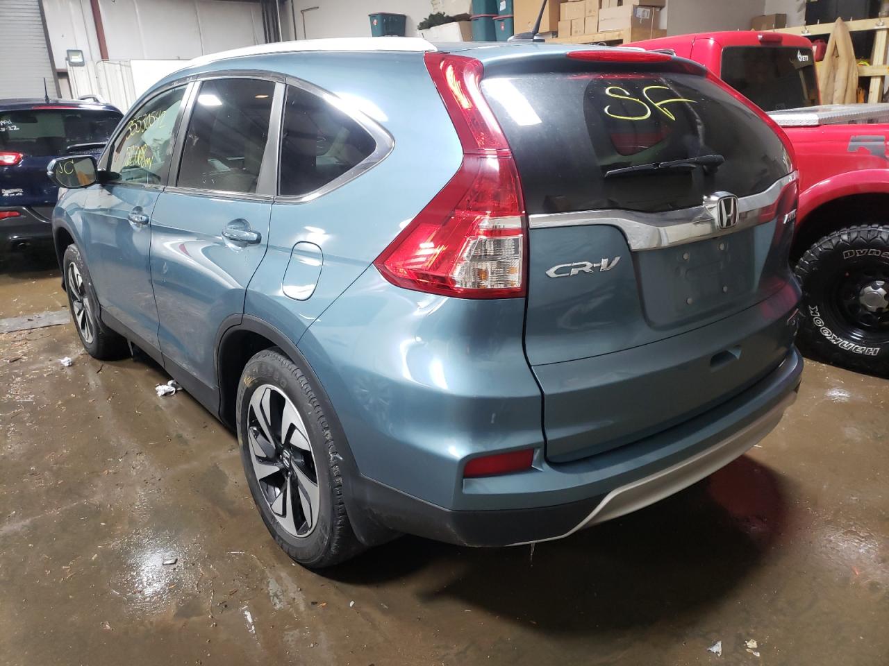 Photo 3 from auction – 2016 HONDA CR-V TOURI with VIN 5J6RM4H96GL065007