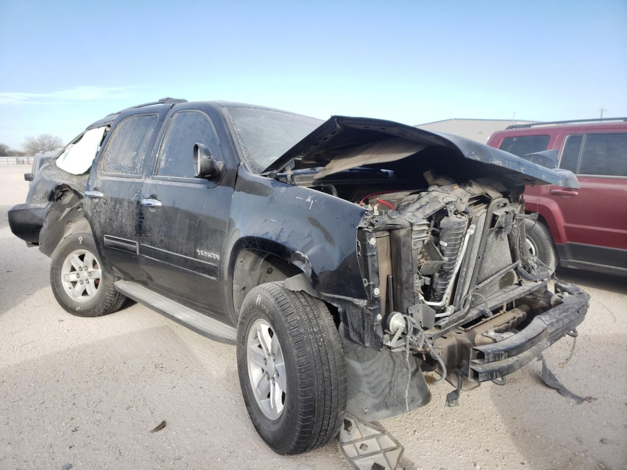 GMC YUKON SLT 2011 with VIN 1GKS2CE05BR344598 - Photo from auction