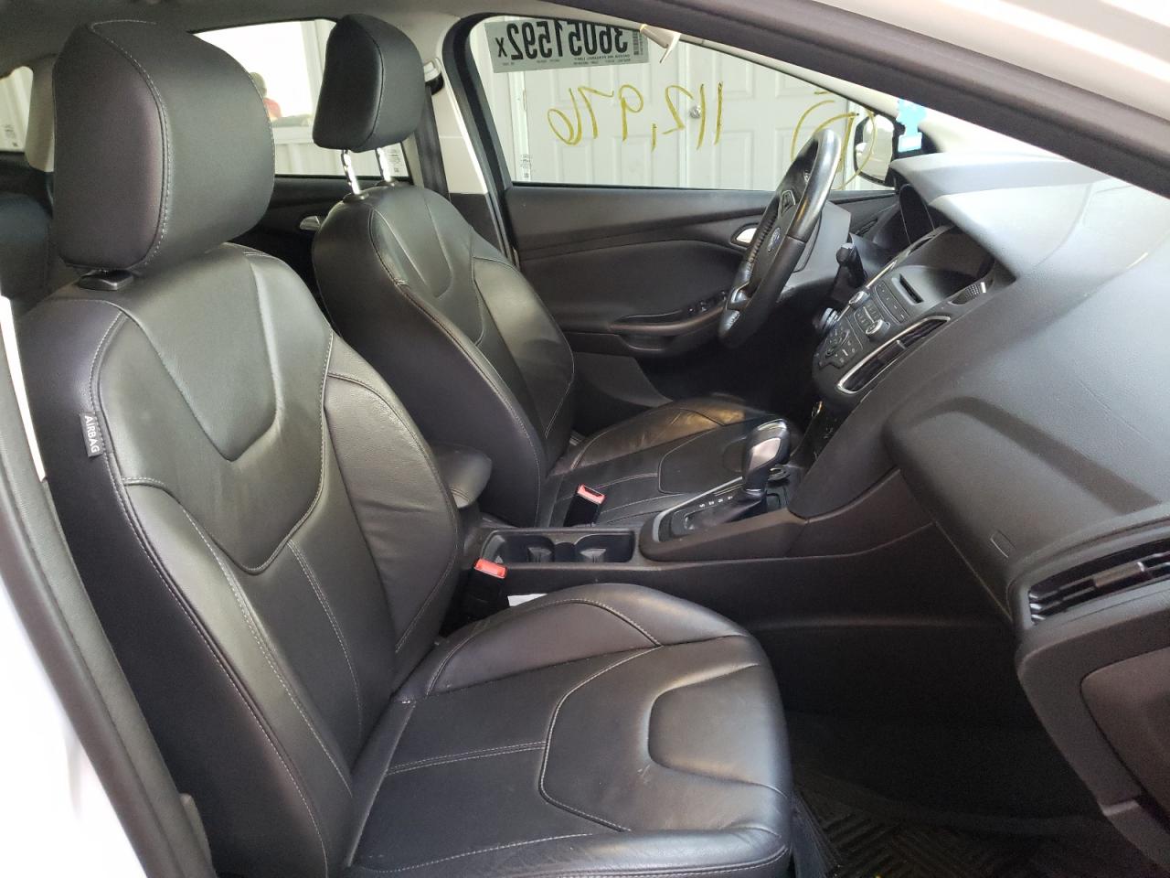 Photo 5 from auction – 2016 FORD FOCUS SE with VIN 1FADP3F27GL226820