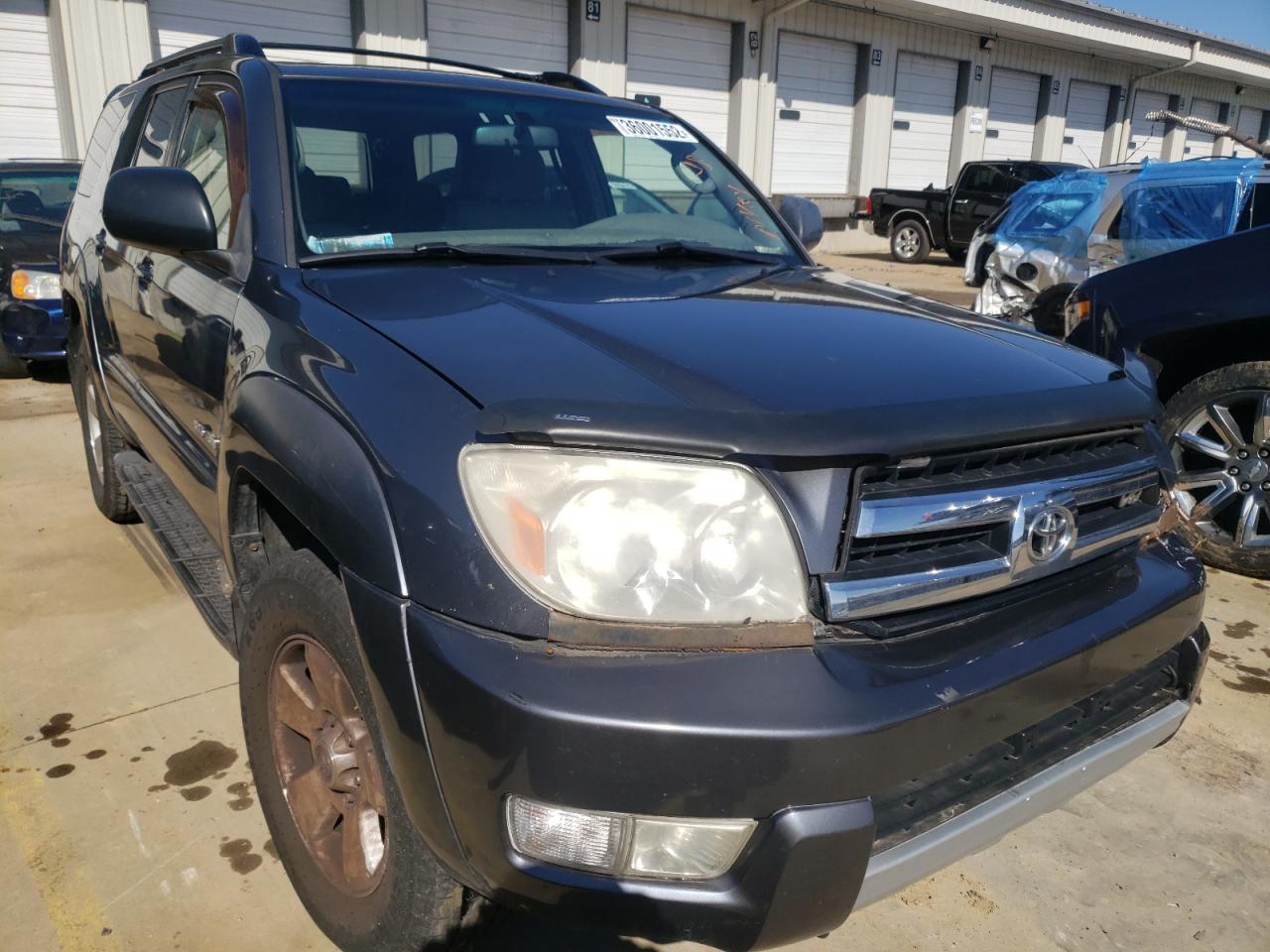 TOYOTA 4RUNNER SR 2003 with VIN JTEBT14R430027636 - Photo from auction
