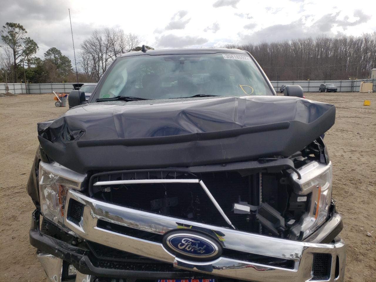 Photo 9 from auction – 2019 FORD F150 with VIN 1FTMF1E54KFA75696