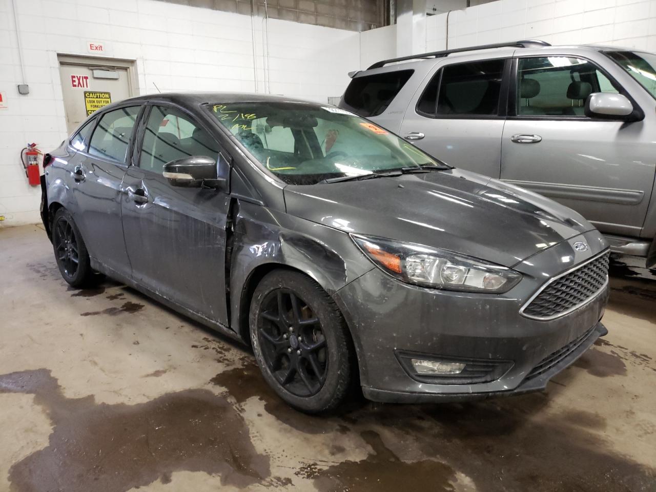 FORD FOCUS SE 2016 with VIN 1FADP3F2XGL267362 - Photo from auction