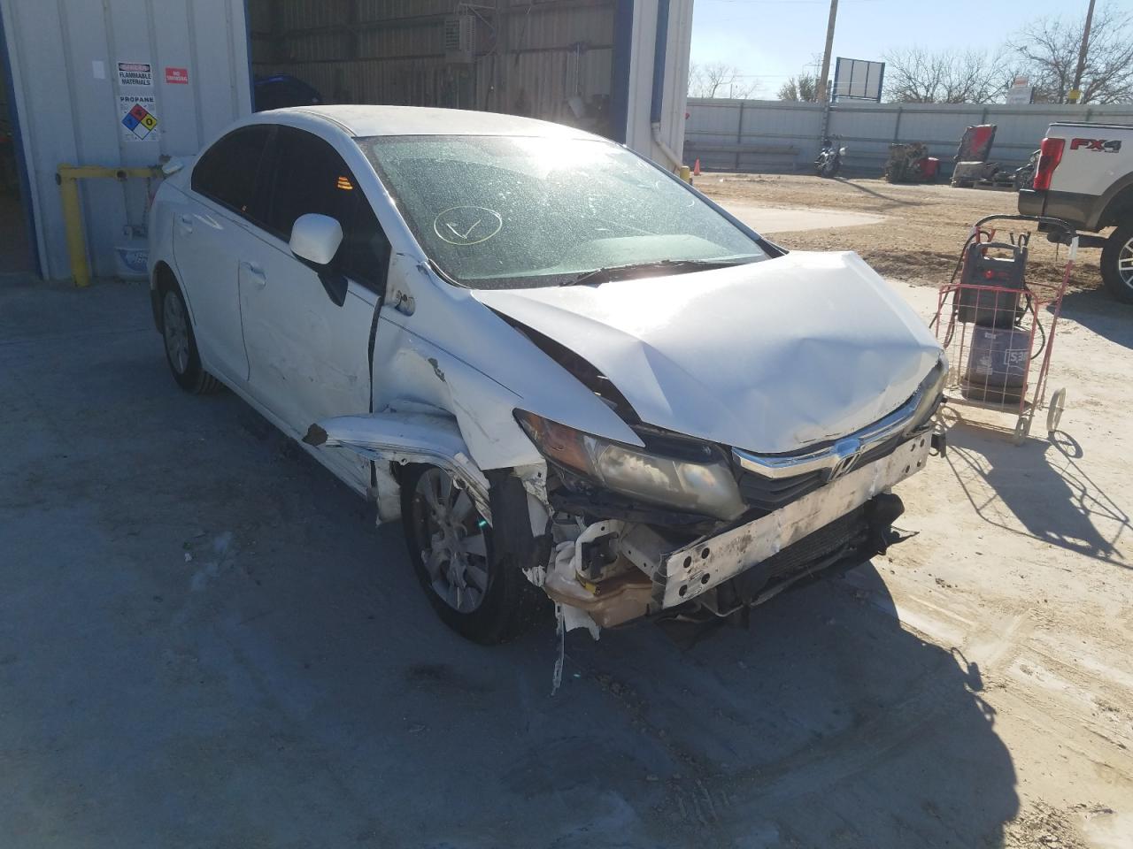 HONDA CIVIC LX 2012 with VIN 2HGFB2F53CH305822 - Photo from auction