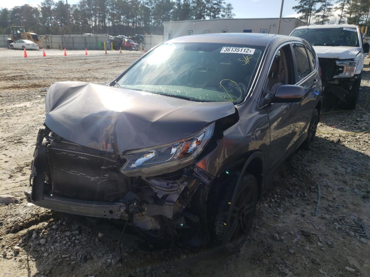 Photo 2 from auction – 2015 HONDA CR-V EX with VIN 3CZRM3H52FG704874
