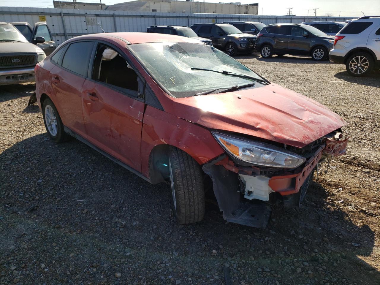 FORD FOCUS SE 2018 with VIN 1FADP3F29JL277534 - Photo from auction