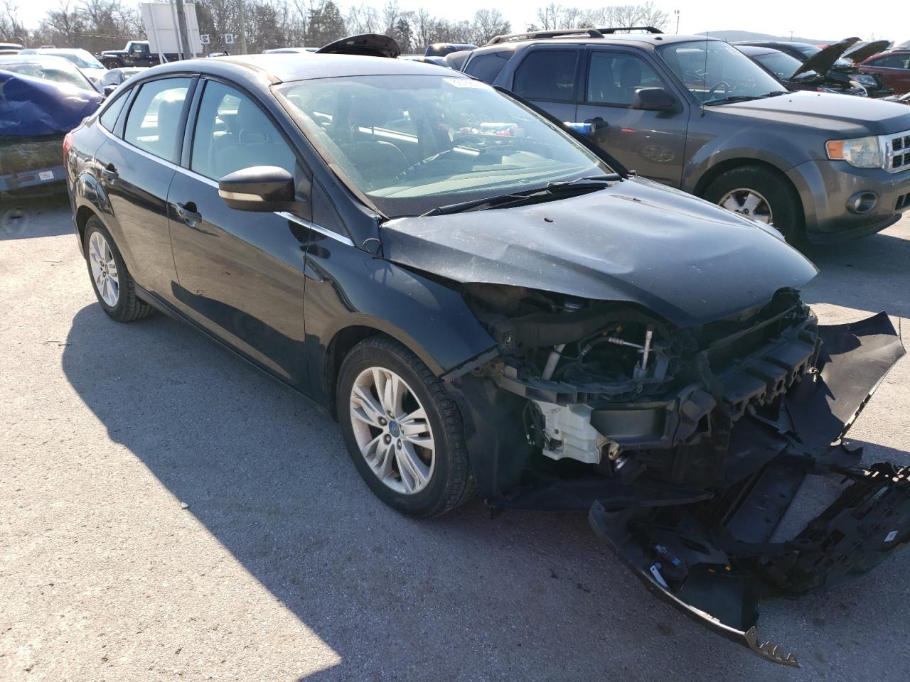 FORD FOCUS SEL 2012 with VIN 1FAHP3H22CL157138 - Photo from auction