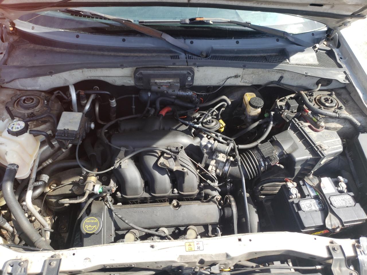 Photo 7 from auction – 2003 MAZDA TRIBUTE LX with VIN 4F2YZ04153KM24861