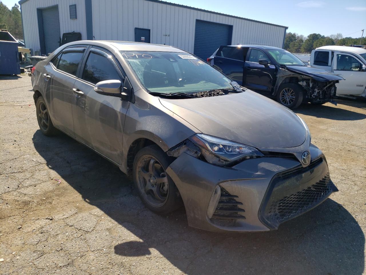 TOYOTA COROLLA L 2018 with VIN 5YFBURHE8JP764381 - Photo from auction