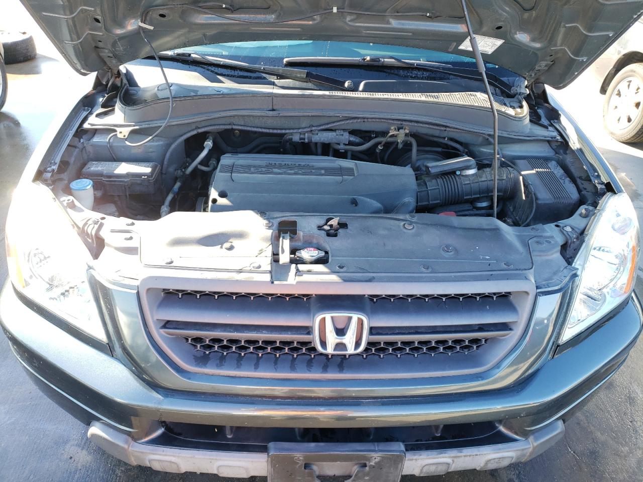 Photo 7 from auction – 2003 HONDA PILOT EXL with VIN 2HKYF18573H577669