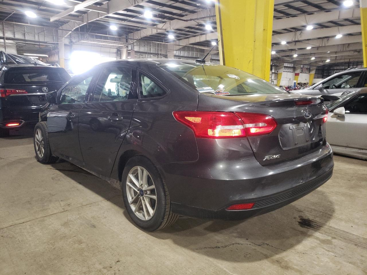 Photo 3 from auction – 2018 FORD FOCUS SE with VIN 1FADP3F22JL252569