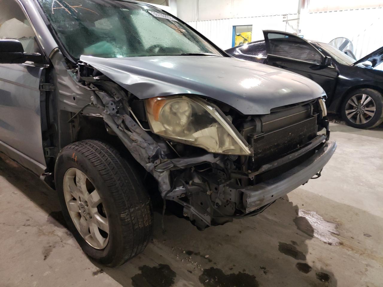 Photo 9 from auction – 2007 HONDA CR-V EX with VIN JHLRE38577C024558