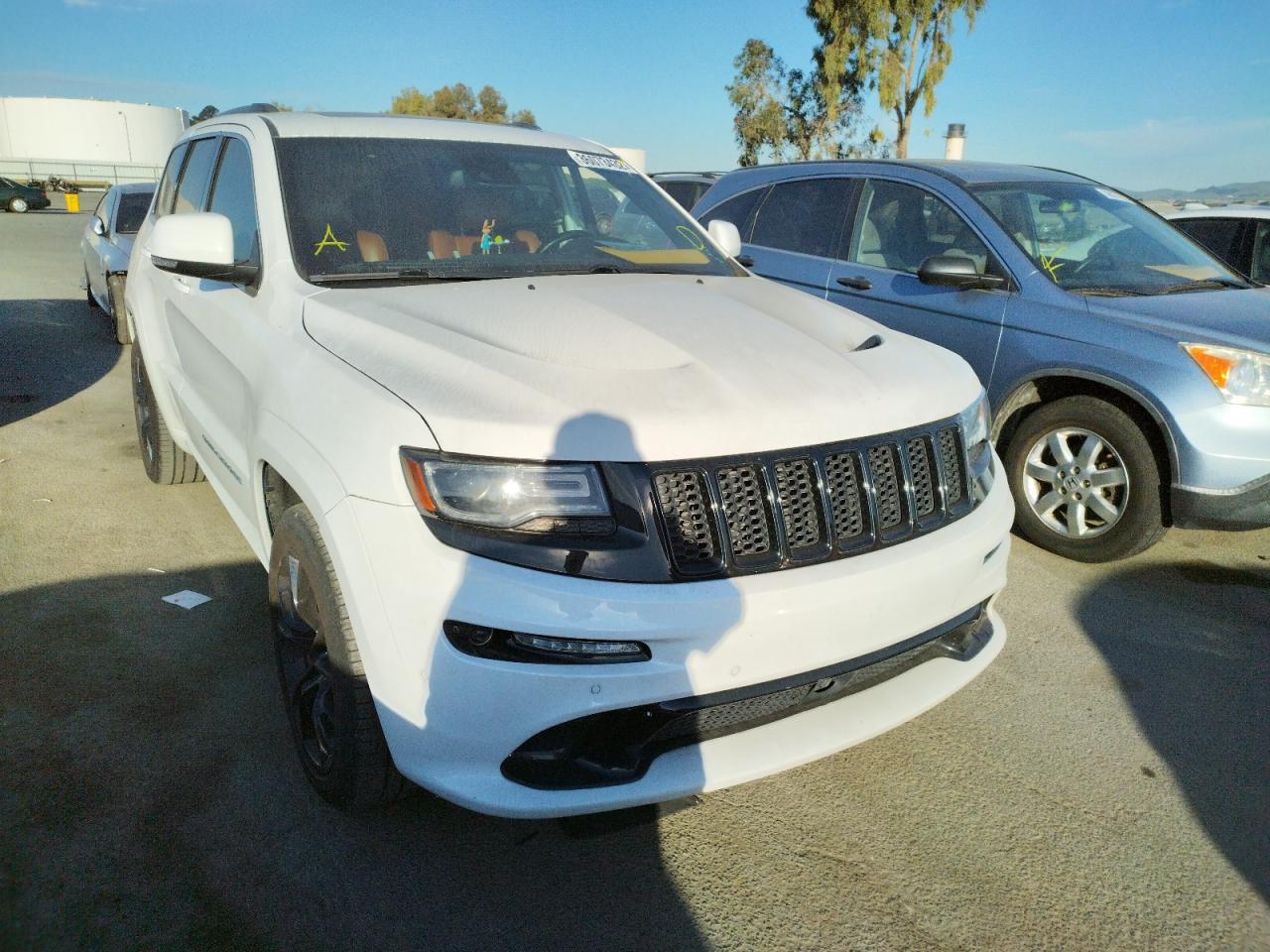 JEEP GRAND CHER 2014 with VIN 1C4RJFDJ2EC387828 - Photo from auction