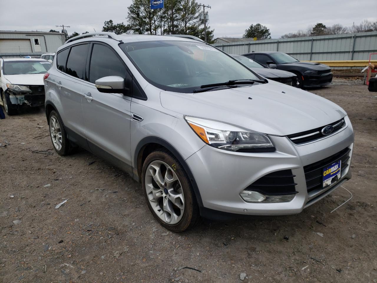 FORD ESCAPE TIT 2014 with VIN 1FMCU0J96EUC44035 - Photo from auction