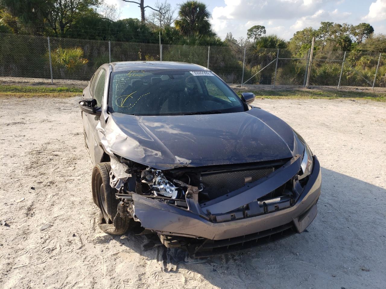 Photo 9 from auction – 2017 HONDA CIVIC LX with VIN 19XFC2F55HE001244