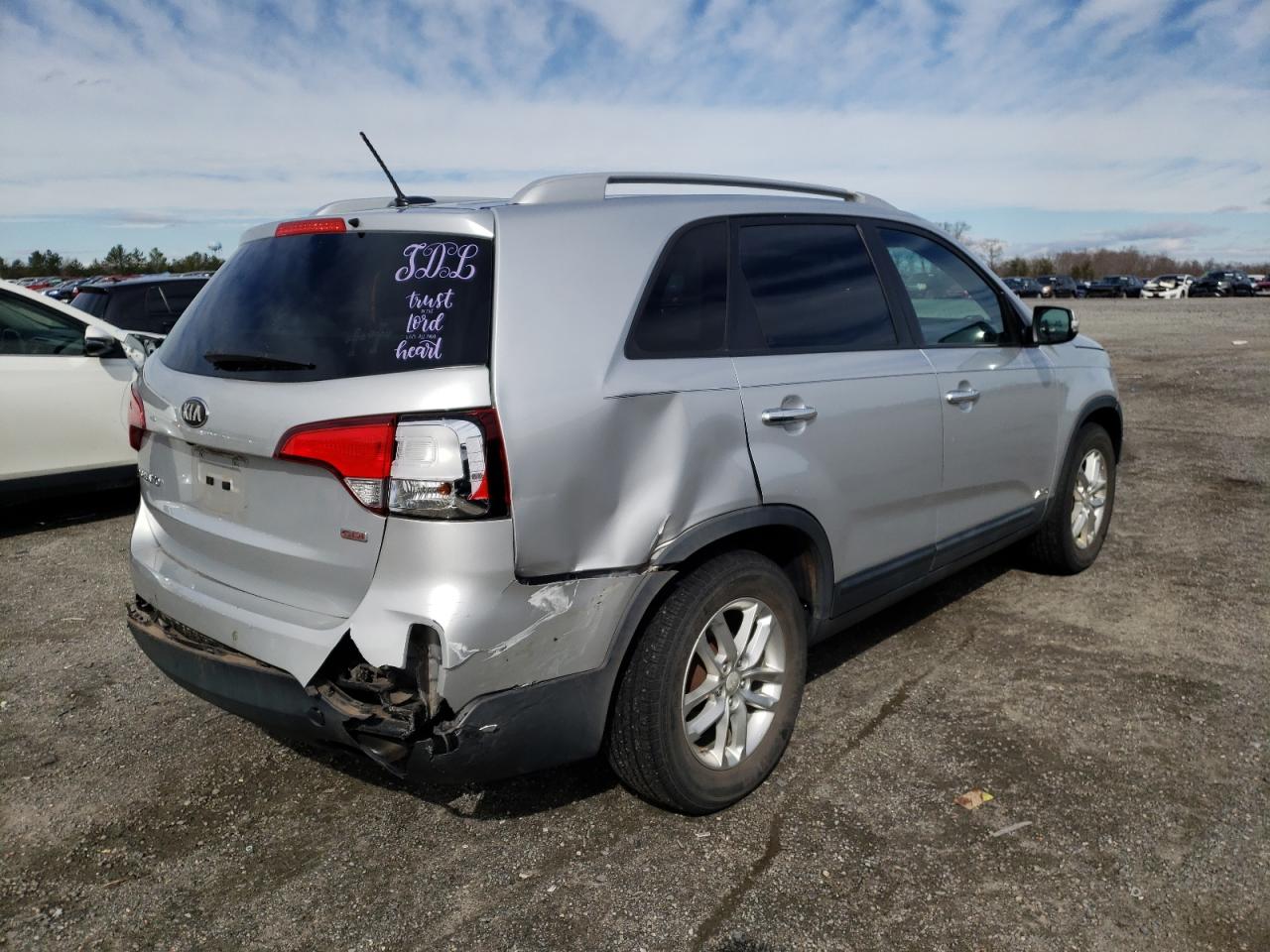 Photo 4 from auction – 2014 KIA SORENTO LX with VIN 5XYKTDA67EG481554