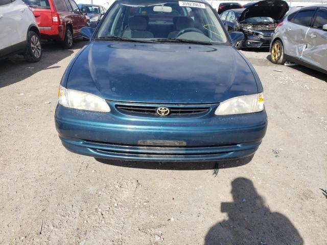 Photo 9 from auction – 1998 TOYOTA COROLLA with VIN 1NXBR18E5WZ032590