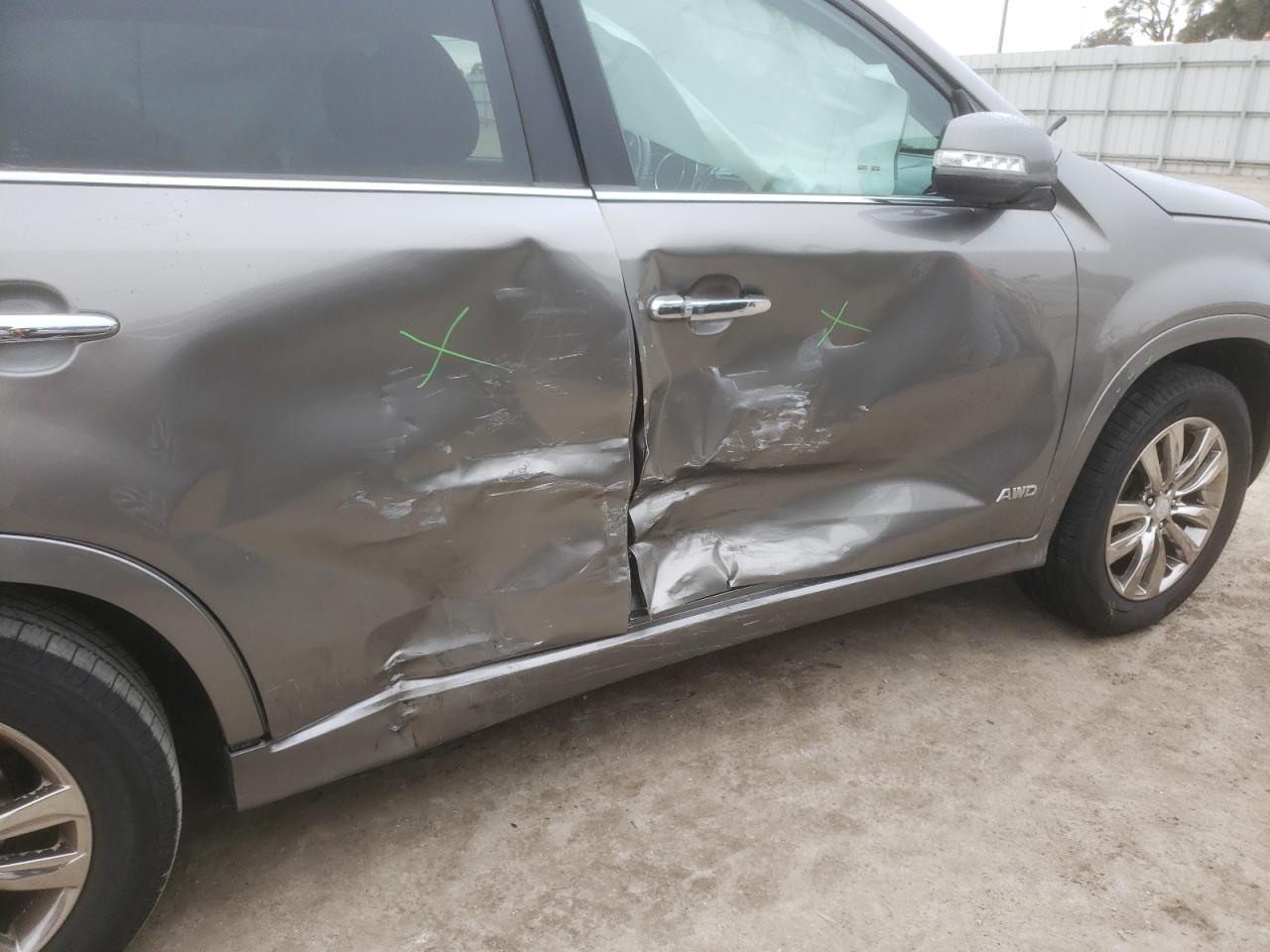 Photo 9 from auction – 2012 KIA SORENTO SX with VIN 5XYKWDA27CG229482
