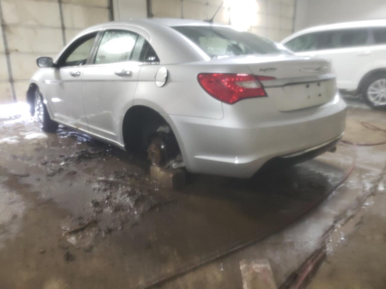 Photo 3 from auction – 2011 CHRYSLER 200 TOURIN with VIN 1C3BC1FB8BN625349