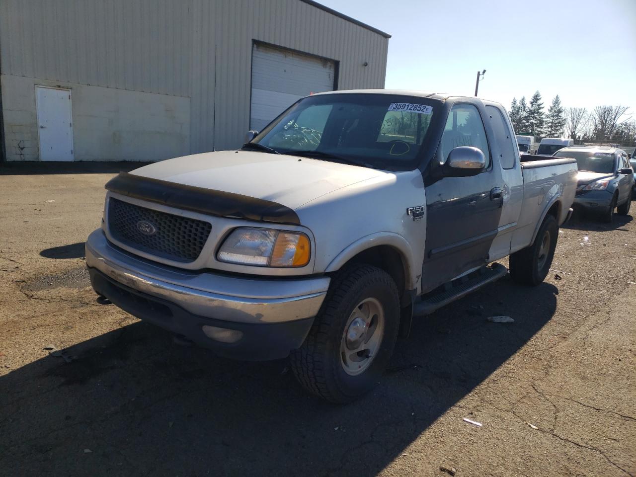 Photo 2 from auction – 2000 FORD F150 with VIN 1FTRX18L6YKA02276