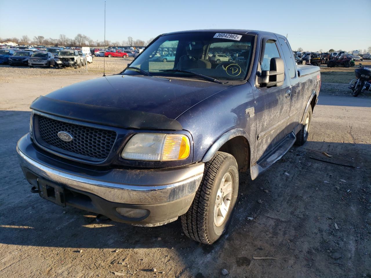 Photo 2 from auction – 2002 FORD F150 with VIN 1FTRX18L42NB00695