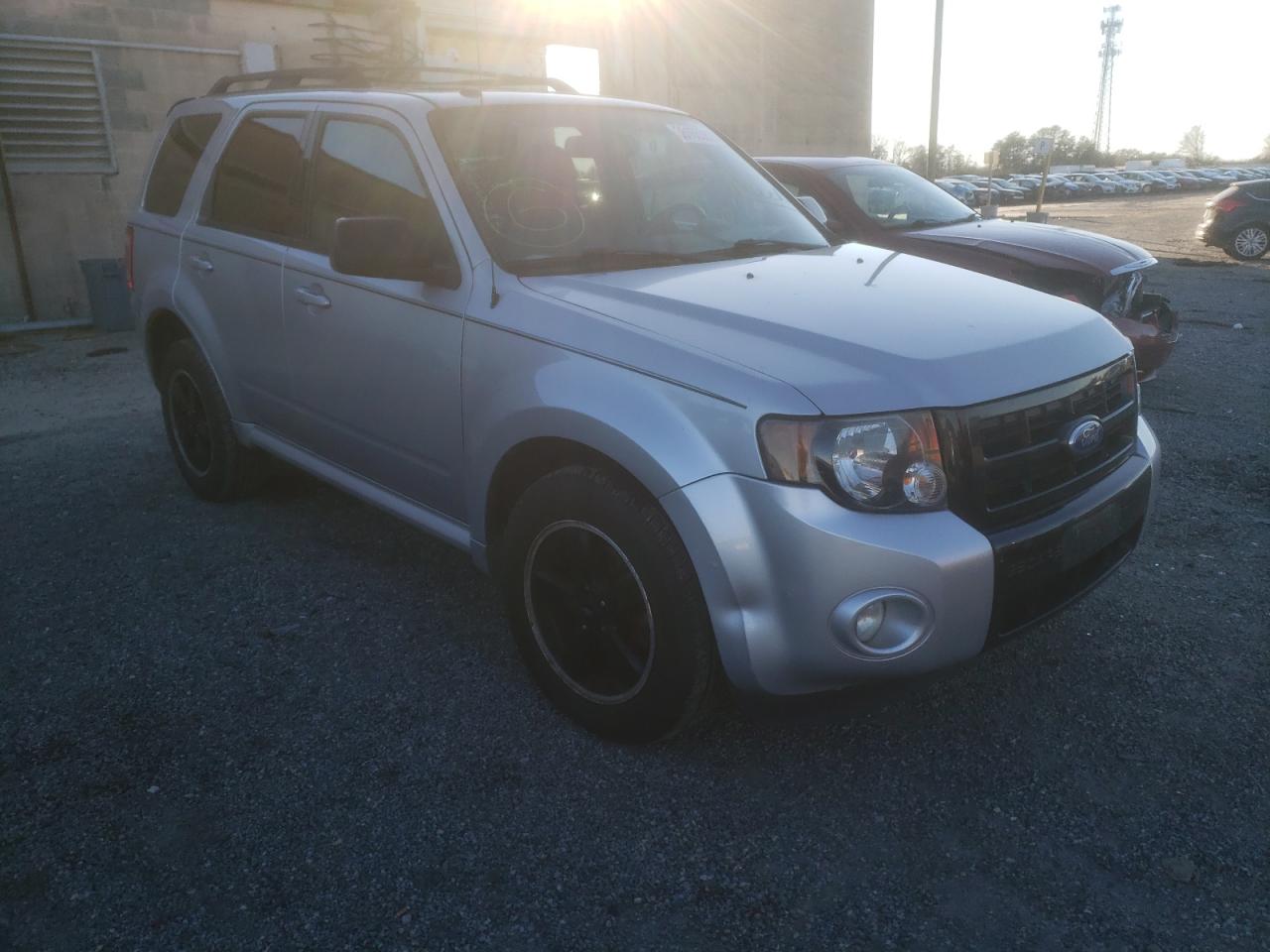 FORD ESCAPE XLT 2011 with VIN 1FMCU9DG1BKC28900 - Photo from auction