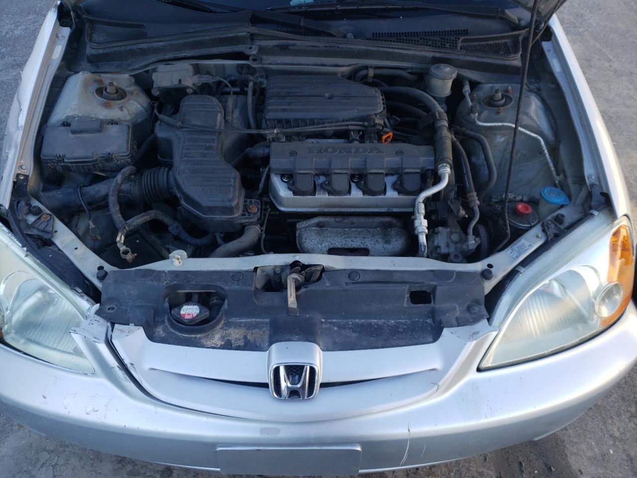 Photo 7 from auction – 2003 HONDA CIVIC LX with VIN 1HGEM225X3L001790