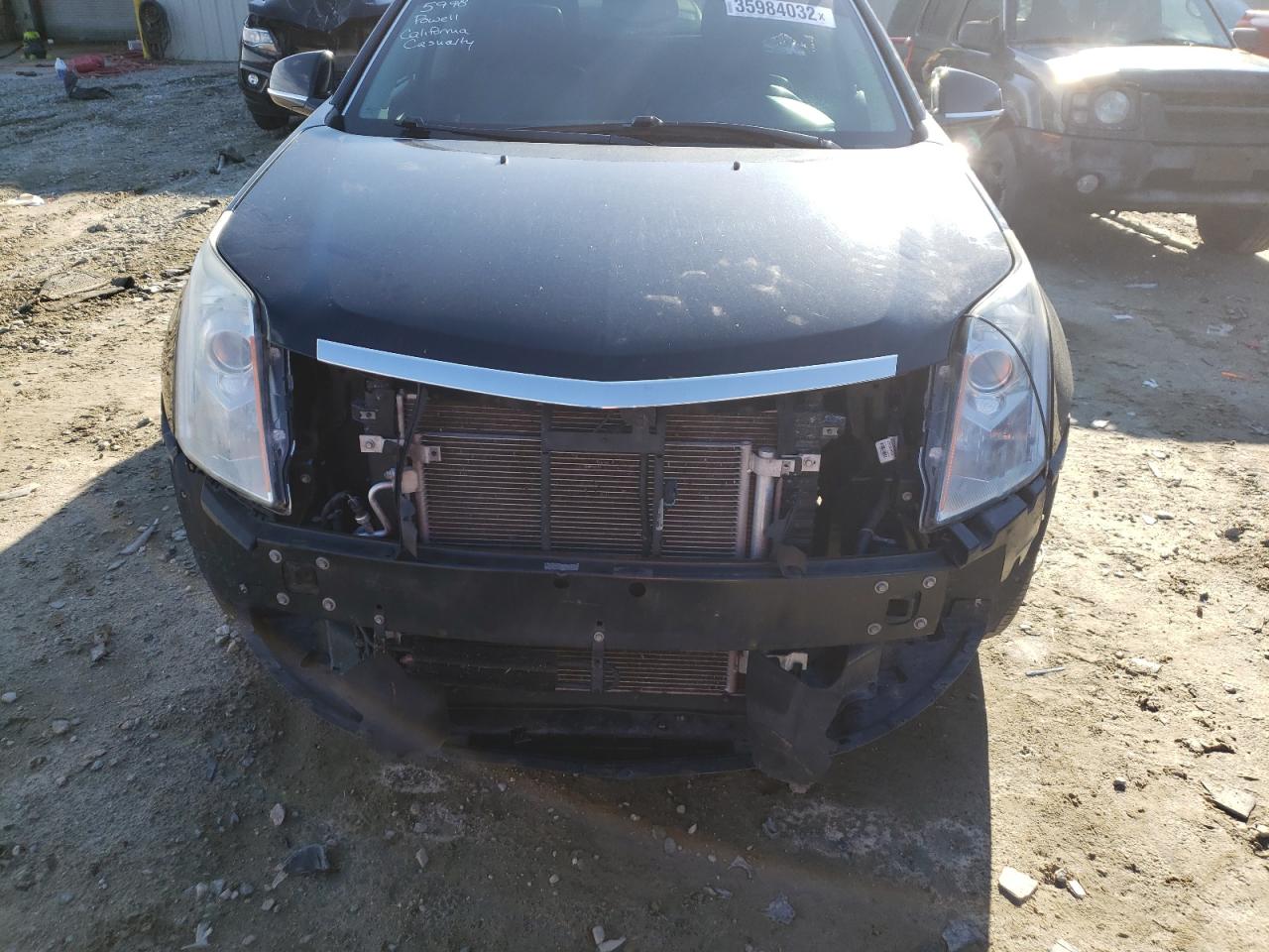 Photo 9 from auction – 2014 CADILLAC SRX PERFOR with VIN 3GYFNCE38ES677906