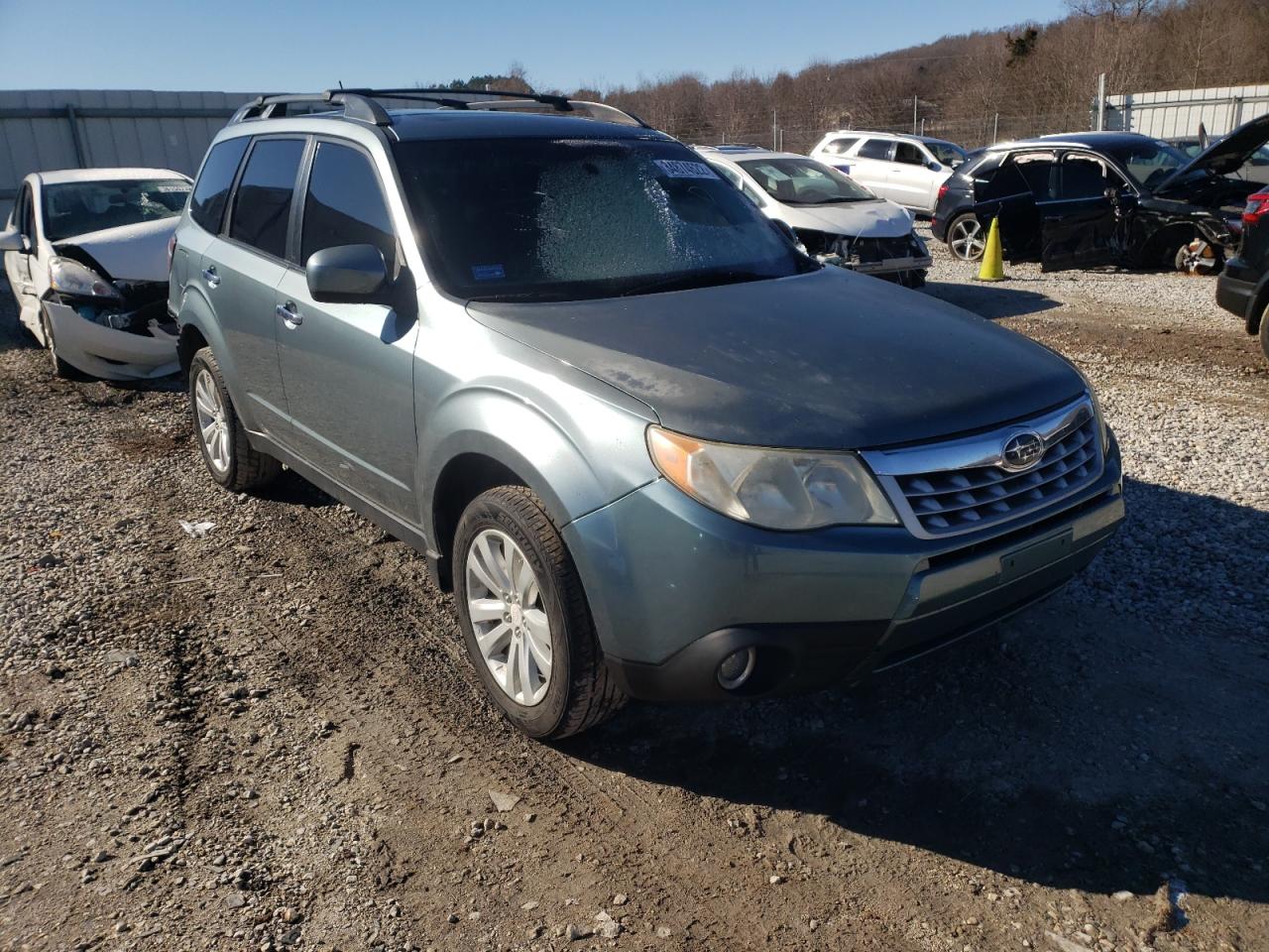 SUBARU FORESTER L 2011 with VIN JF2SHBEC6BH768572 - Photo from auction