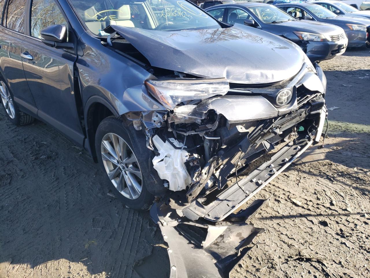 Photo 9 from auction – 2018 TOYOTA RAV4 LIMIT with VIN JTMDFREV0JD238482