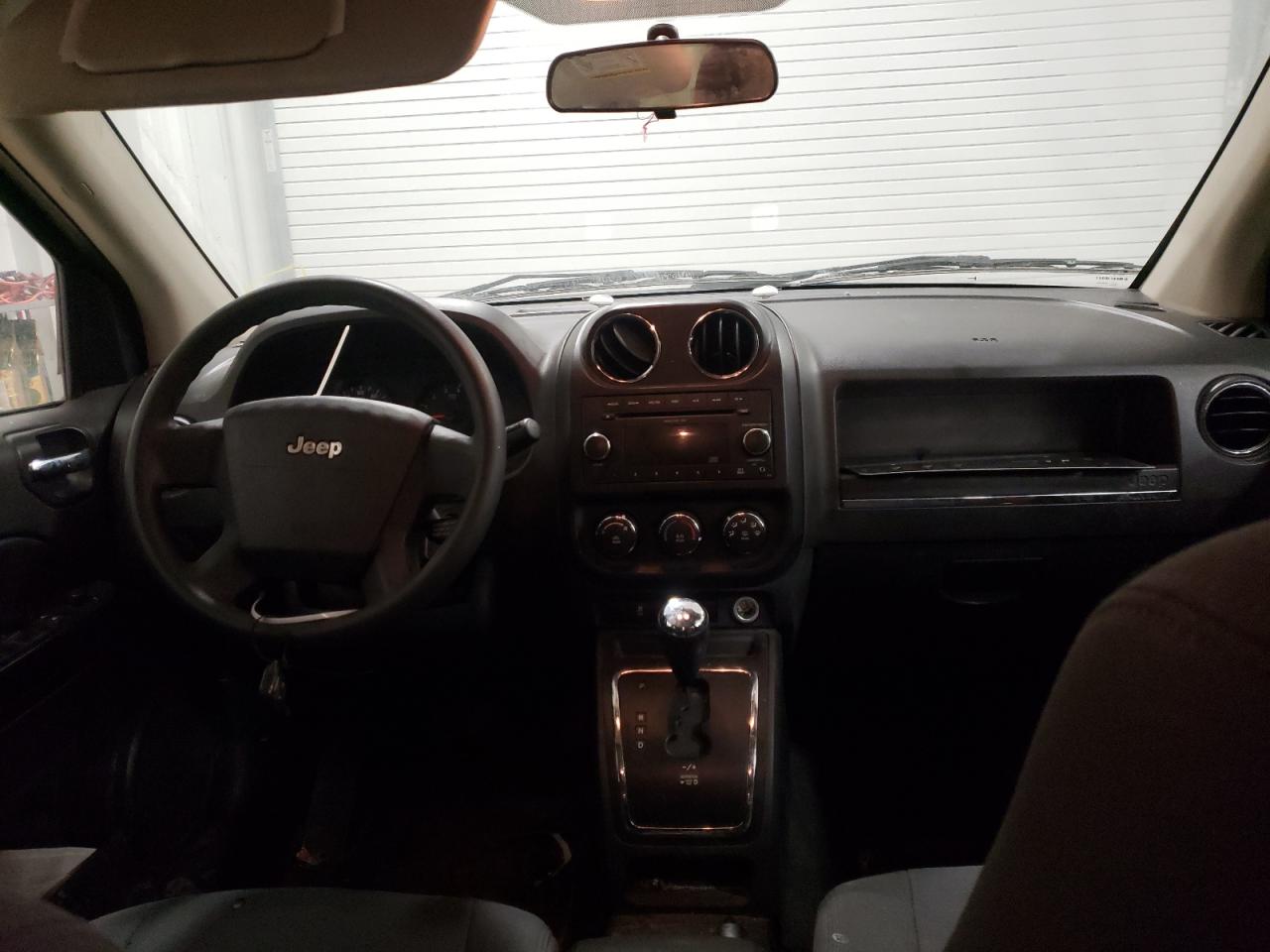 Photo 9 from auction – 2010 JEEP COMPASS SP with VIN 1J4NT4FB0AD521608