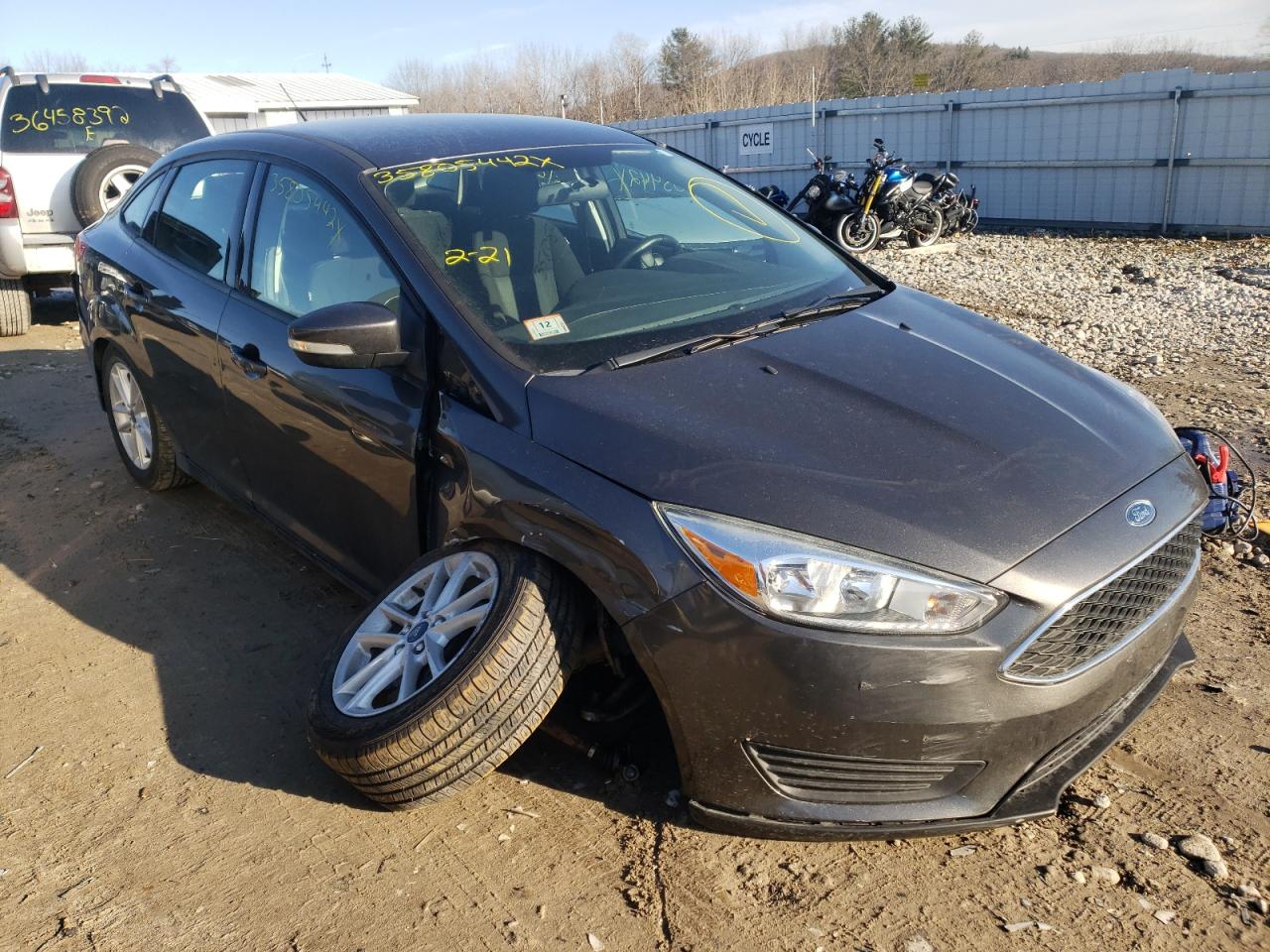 FORD FOCUS SE 2015 with VIN 1FADP3F25FL310486 - Photo from auction