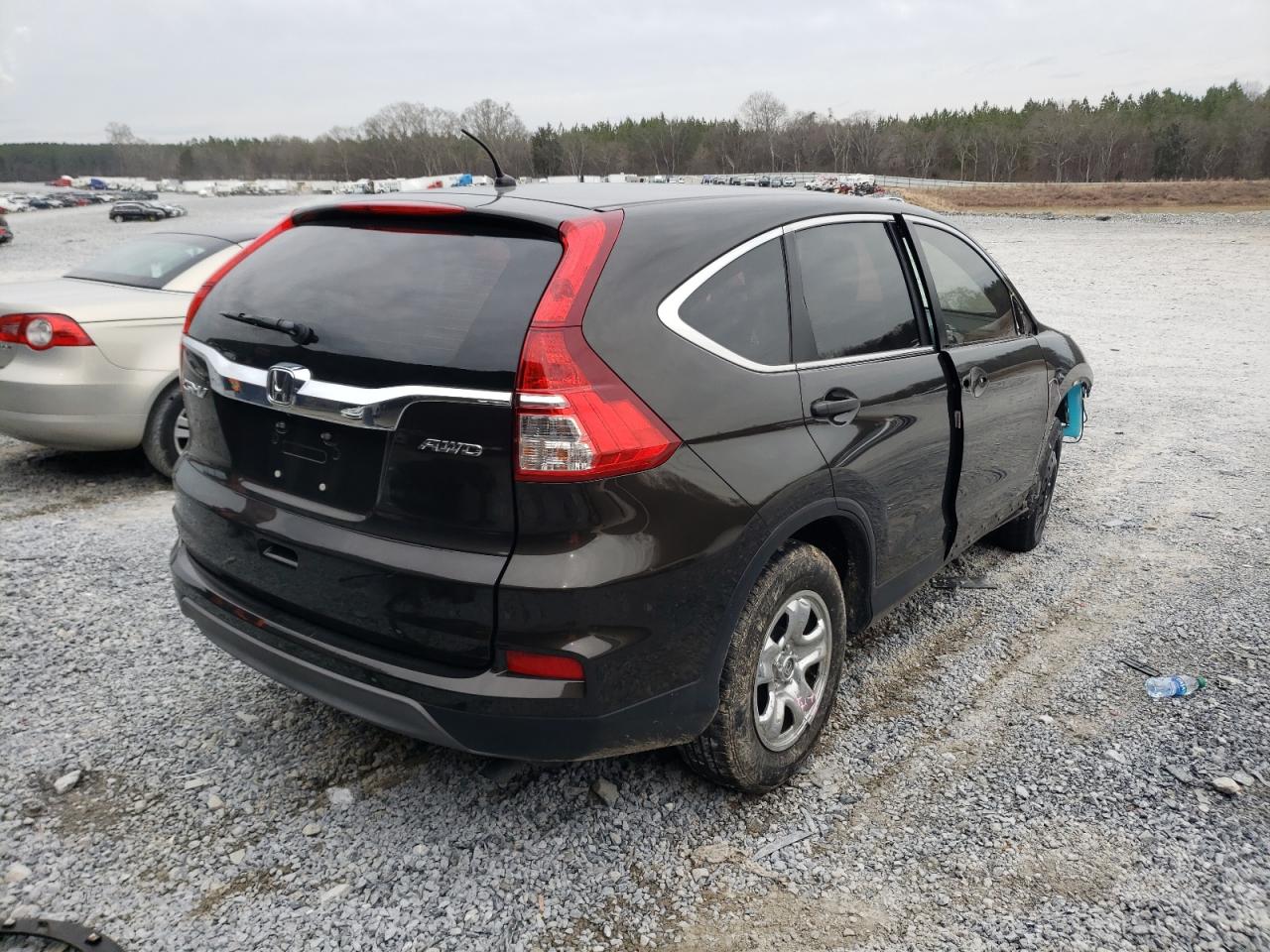 Photo 4 from auction – 2015 HONDA CR-V LX with VIN 5J6RM4H37FL073062