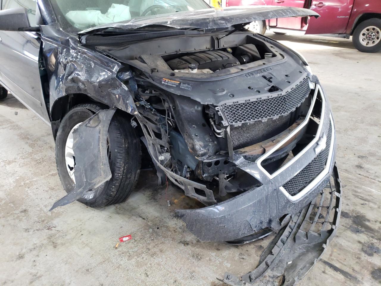 Photo 9 from auction – 2011 CHEVROLET TRAVERSE L with VIN 1GNKRFED8BJ397409
