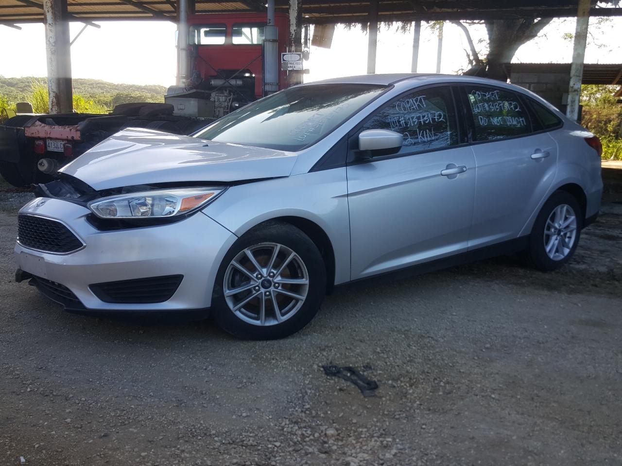 Photo 2 from auction – 2018 FORD FOCUS SE with VIN 1FADP3F25JL304910