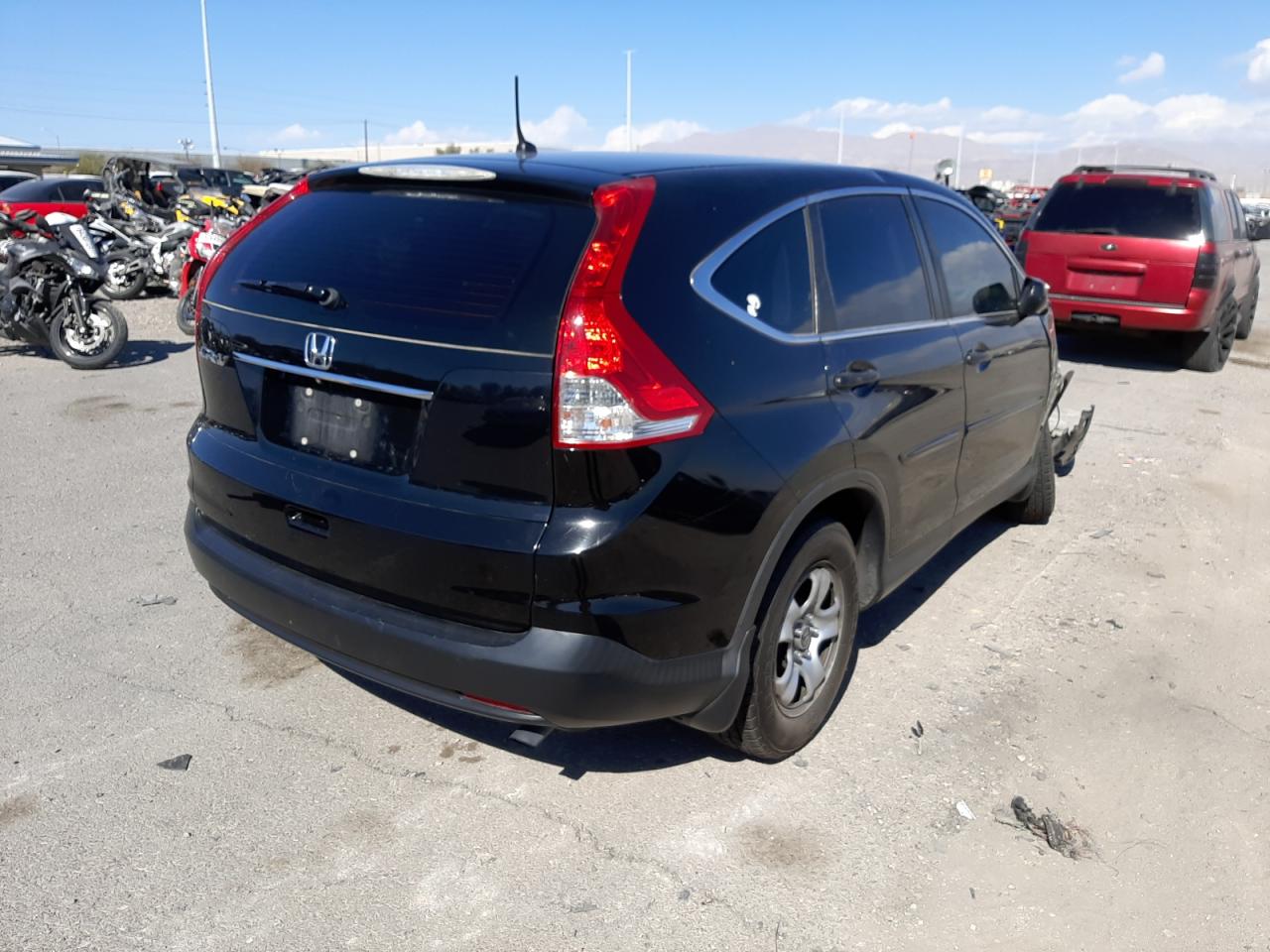 Photo 4 from auction – 2014 HONDA CR-V LX with VIN 5J6RM3H38EL019925
