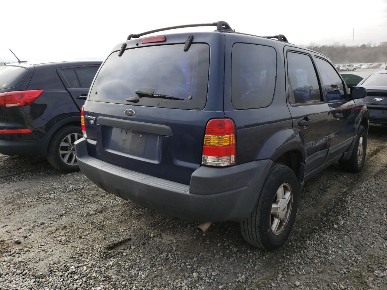 Photo 4 from auction – 2003 FORD ESCAPE XLS with VIN 1FMYU02153KA11822