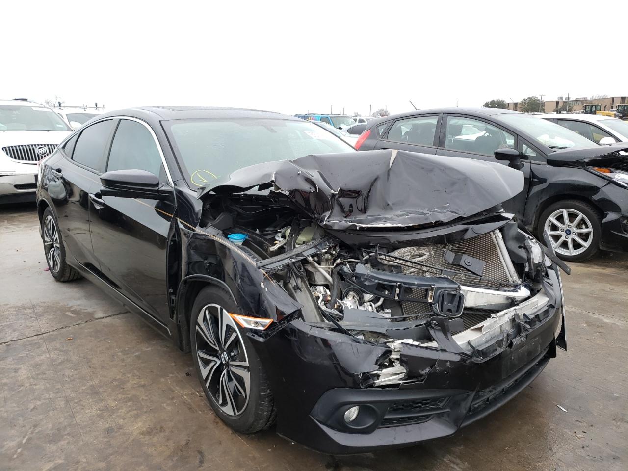 HONDA CIVIC EXL 2017 with VIN 19XFC1F76HE001300 - Photo from auction