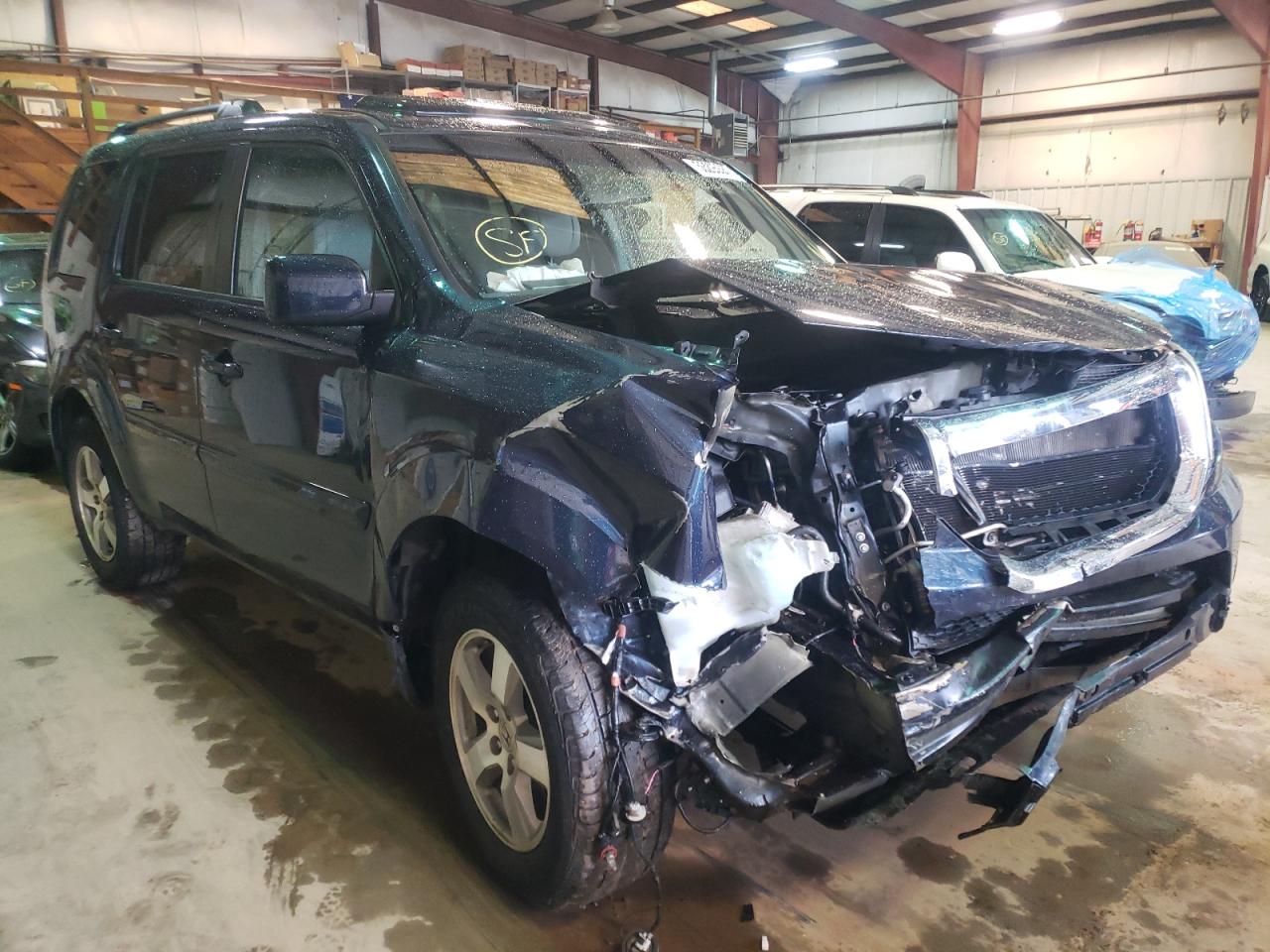 HONDA PILOT EXL 2010 with VIN 5FNYF4H67AB036613 - Photo from auction