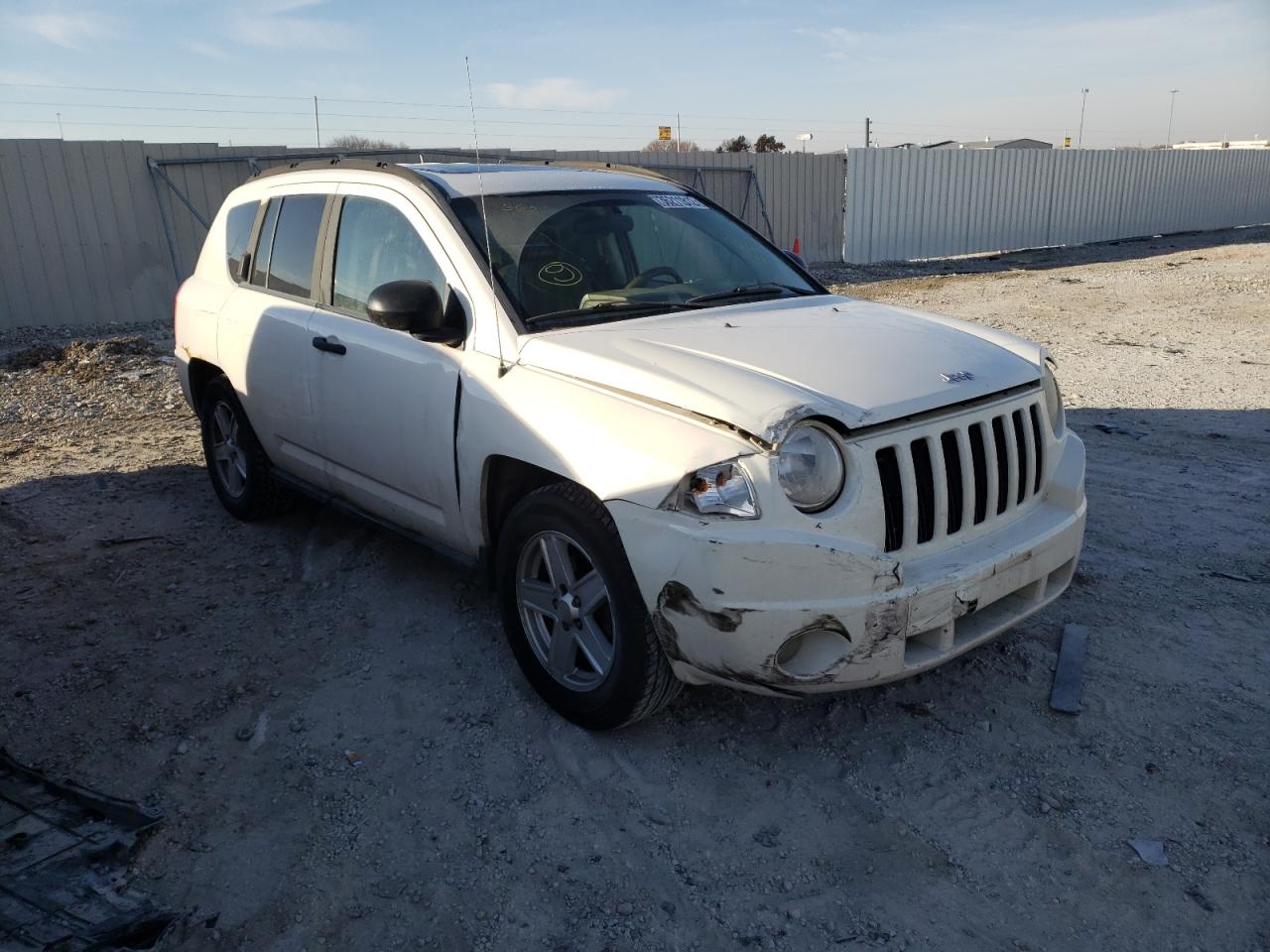 JEEP COMPASS 2007 with VIN 1J8FT47W87D112298 - Photo from auction