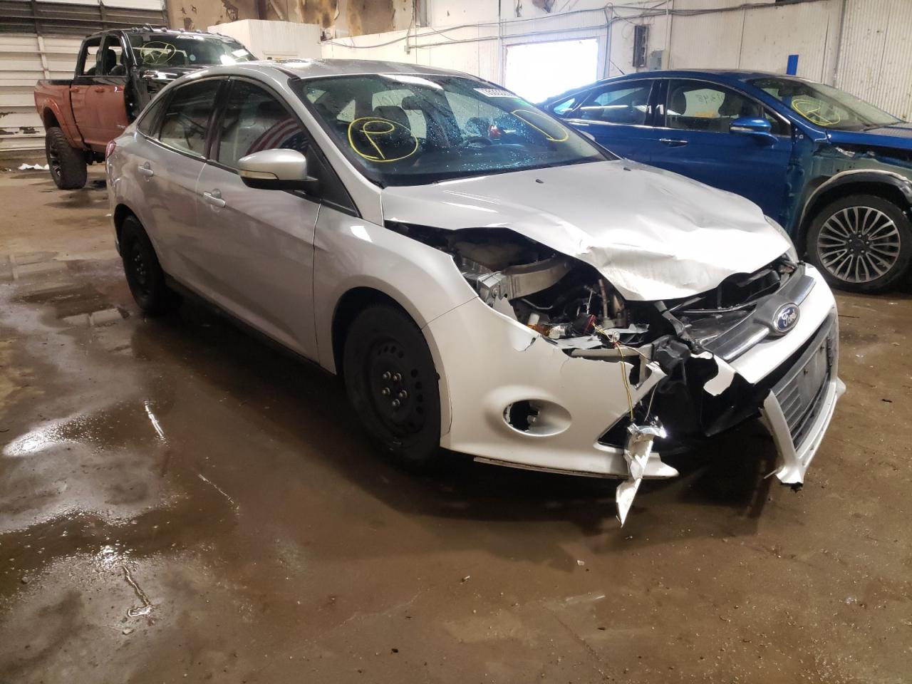 FORD FOCUS SE 2013 con VIN 1FADP3F21DL296180 - Foto de la subasta